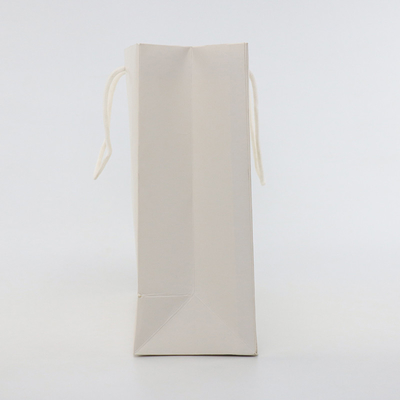 La gravure imprimant la coutume a imprimé des sacs en papier avec l'ODM de sacs de cadeau de poignées