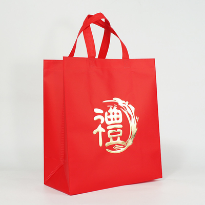 Sac à provisions non tissé réutilisable chinois de poignée de sac de cadeau de nouvelle année avec des logos