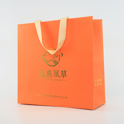 Le cadeau de achat marqué brillant Logo Paper Bags With Rope fait sur commande manipule